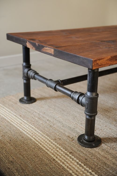 DIY Industrial coffee table for Man Cave. Made with plumbing pipes 